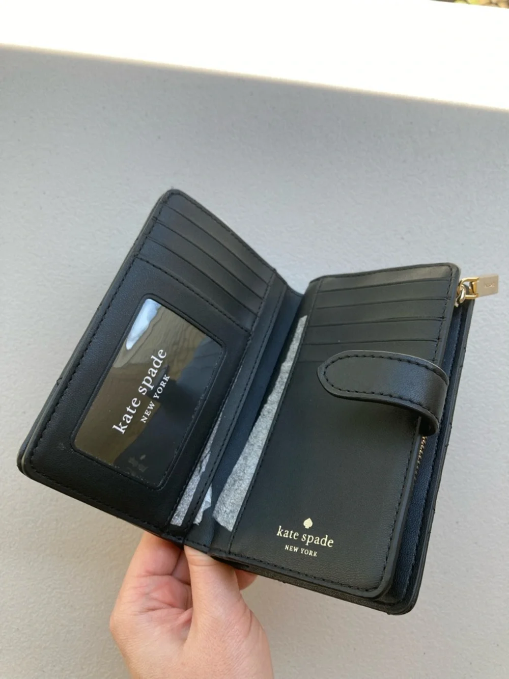 Kate Spade New York Carey Medium Compact Bifold Wallet in Black Quilted Leather